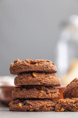 Sweet chocolate cookies on kitchen table.
