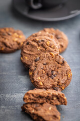 Sweet chocolate cookies on kitchen table.