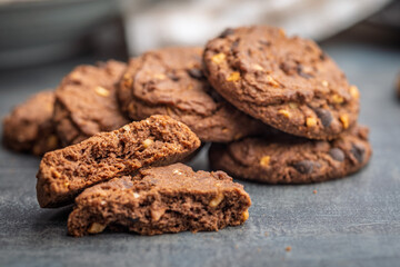 Sweet chocolate cookies on kitchen table.