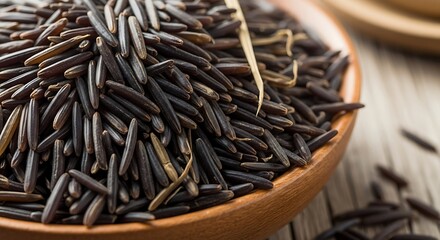 Nutrient-Rich Pile of Wild Rice Grains Close-Up in a Wooden Bowl Ready for Cooking and Delicious