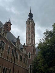 A brick tower viewed from below
