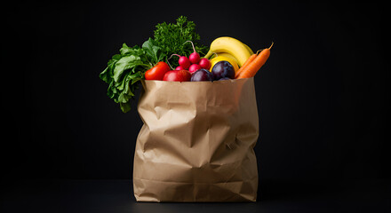 Paper bag filled with fresh vegetables and fruits such as broccoli, lettuce, oranges, apple, cucumber, and strawberries on black background.