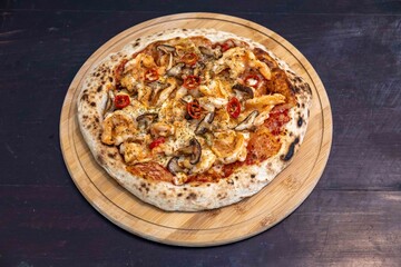 The best pizza in the world, Brazilian shrimp pizza with shiitake mushrooms and red pepper.