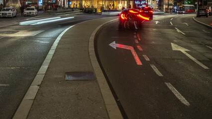 City street scene at night with blurred car lights and illuminated road markings. - Powered by Adobe