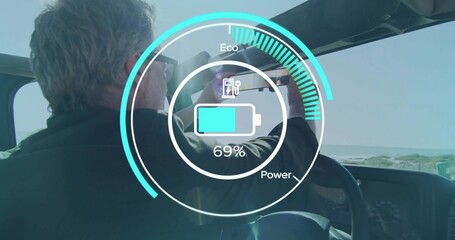 Adjusting driver centering rearview mirror in car HUD showing Eco Power gauge at 69%, copy space