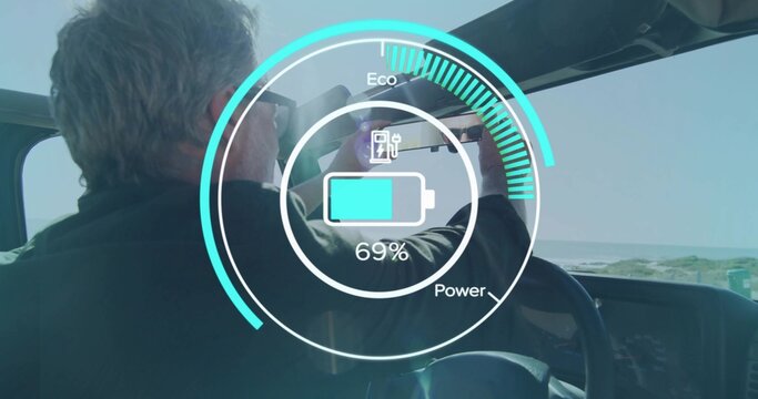 Adjusting driver centering rearview mirror in car HUD showing Eco Power gauge at 69%, copy space