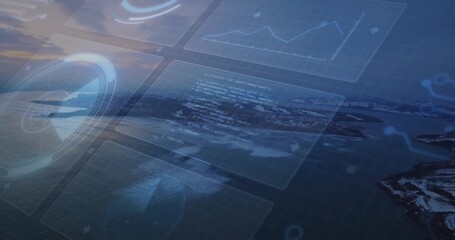 Displaying holographic panels hovering over sea at sunset, with data charts and code snippet window