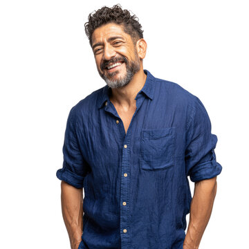 A middle-aged man with a beard smiles warmly, wearing a blue linen shirt against a transparent background. background removed