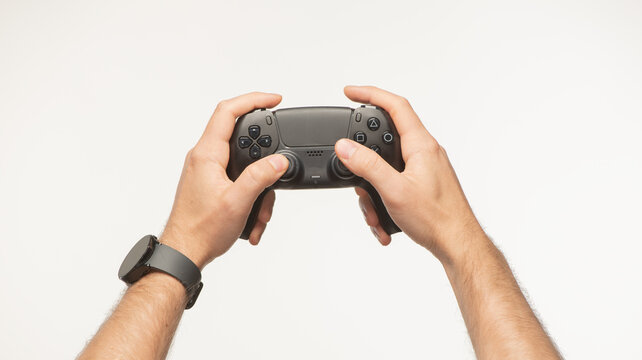 male hands with joystick on white background - Powered by Adobe
