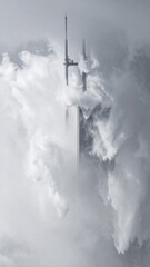 Monochromatic Tower Partially Obscured by Dense White Clouds Against a Bright Sky