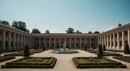 Obraz premium Formal courtyard with classical architecture and manicured gardens