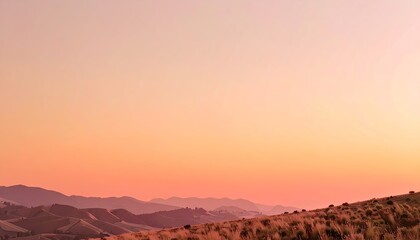 Pink And Orange Sunset Over Rolling Hills