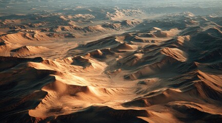 High-altitude desert landscape.  Sunlight highlights rugged mountains and valleys