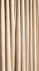 Obraz premium Close Up Shot of Gold Colored Velvet Curtain With Vertical Folds