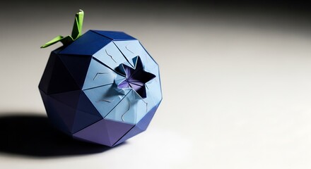 Geometric berry illustration showcases unique artistic paper craftsmanship