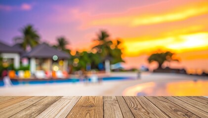 Fototapeta premium A rustic wooden table top, featuring rich grain patterns, with a soft, blurred sunset casting warm hues of orange and pink in the background.