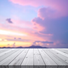 A rustic wooden table top showcases its rich grain and texture, set against a softly blurred sky background with gentle hues of blue and white.