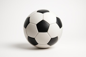 Naklejka premium Classic black and white soccer ball isolated on white with soft shadow crisp sports equipment cutout for clean design mockups