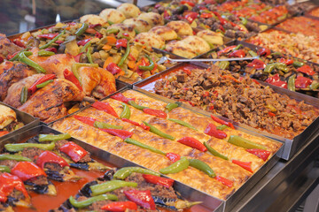 Colorful display of diverse dishes at a food market