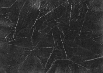 Black creased paper texture background. Abstract grunge surface graphic element for overlay design.