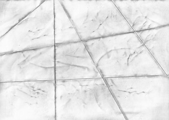 Folded paper texture with soft creases. Creased white paper with grey stains background. 