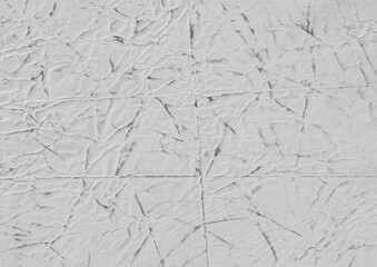 Crumpled paper texture with wrinkles and folds. Grunge rough surface with stains for overlay design.