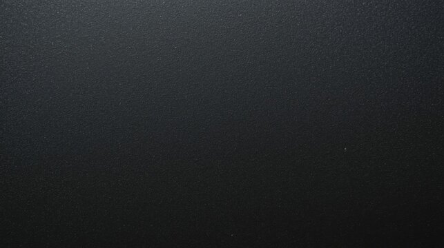 Closeup of smooth black matte plastic surface