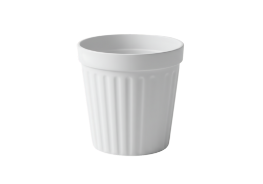A plain white disposable paper cup with vertical ridges isolated on a black background
