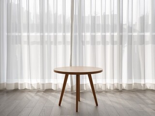 An empty round wooden table in a bright room in front of a window with sheer white curtains.