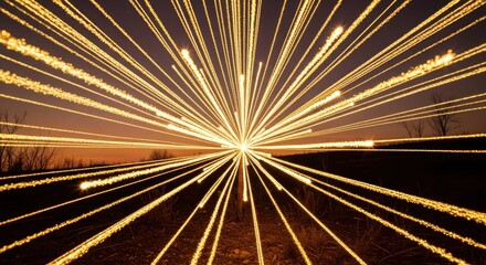 Golden light beams converge into point over horizon, blurry time-lapse shot
