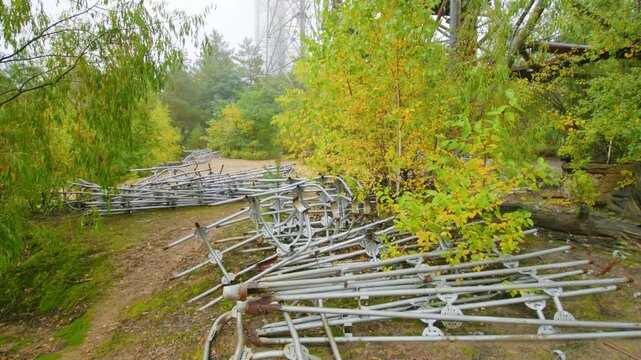 Footage captures the imposing, abandoned Duga 1 over the horizon, OTH radar system, a relic of the Cold War Soviet anti ballistic missile early-warning network, nestled within the overgrown landscape 