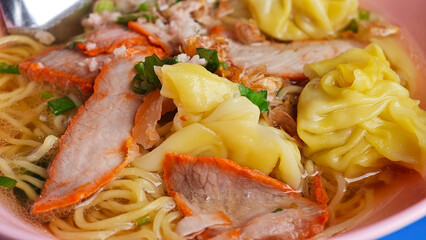 Egg noodle with wonton and red roasted pork.
