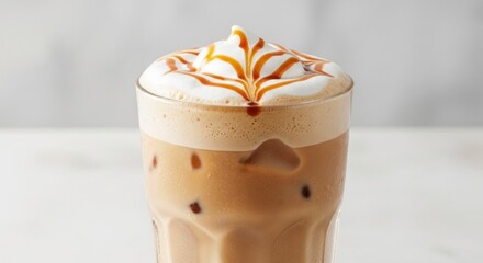 Iced Coffee Drink With Whipped Cream And Caramel Swirls Against White Background