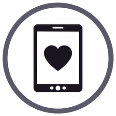 Tablet computer with heart symbol icon for dating app social media or health