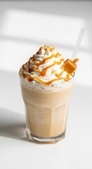 Frothy Caramel Drink with Whipped Cream and Straw on White Background