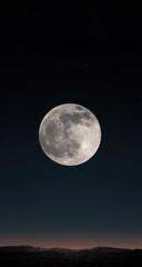Full moon over a dark night sky