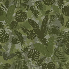 Fototapeta premium Seamless botanical camouflage pattern featuring tropical leaves in shades of green, seamless pattern, Stock royalty image.