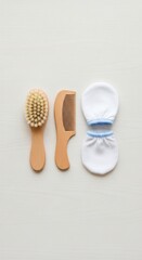 Baby Grooming Essentials on White Background Wooden Brush Comb and Mittens Flat Lay