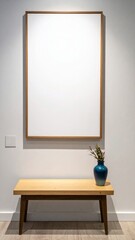 Empty White Canvas Hanging Above Wooden Bench with a Blue Vase in Gallery