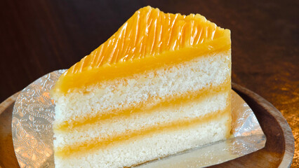 Layer orange cake topped with orange marmalade.