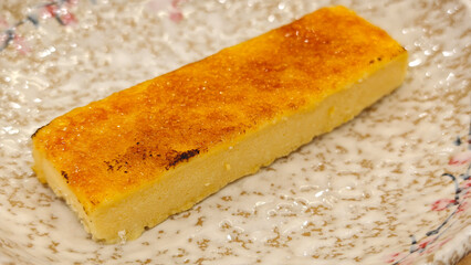 Crème brûlée, vanilla beans, blowtorch, sugar.