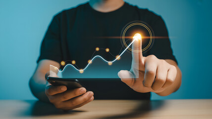 Man tracks upward financial growth on holographic chart using smartphone analytics for business success