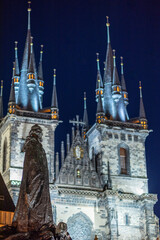 Jan Hus memorial in the Old Town Square with Gothic Tyn Church in the background, in Prague, Czech Republic