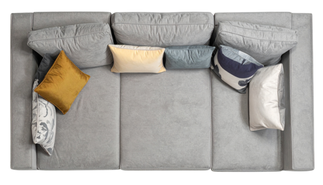 Overhead view of a large, grey sectional sofa with various colorful throw pillows, creating a cozy living space