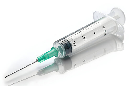 Medical syringe with needle on white background