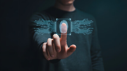 Person's finger touches digital fingerprint scanner for secure access and biometric identification technology