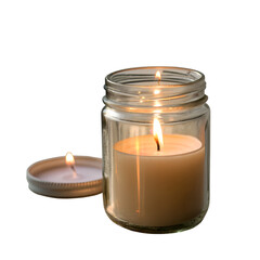 A festive Christmas tree-shaped candle burns with a warm glow in the dark, its flame casting a soft light