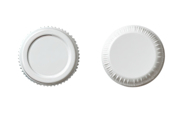 Two identical white circular lids, side-by-side, on a plain background.  Each lid has a textured ribbed edge
