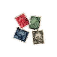 Four vintage postage stamps, various colors