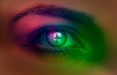 Obraz premium Beautiful girl eye with colorful surreal make up. Beauty girl with bright color makeup. Abstract colourful make-up, Art design